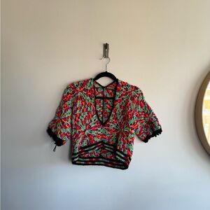 Vintage style hand knit cropped/deep v top….